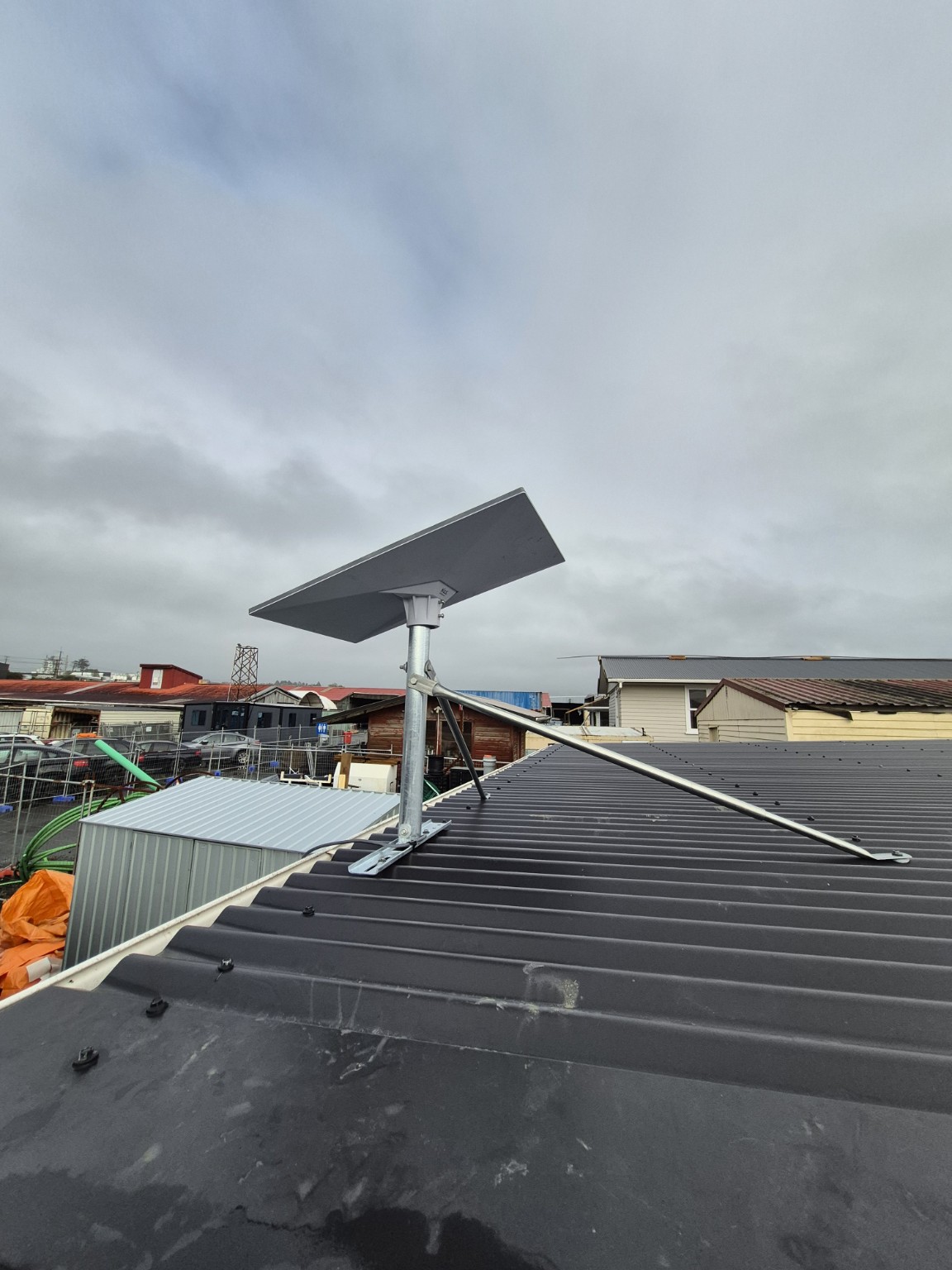 Starlink dish installed on a commercial roof